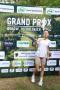 zdjęcie dziewczyny z medalem na ściance grand prix